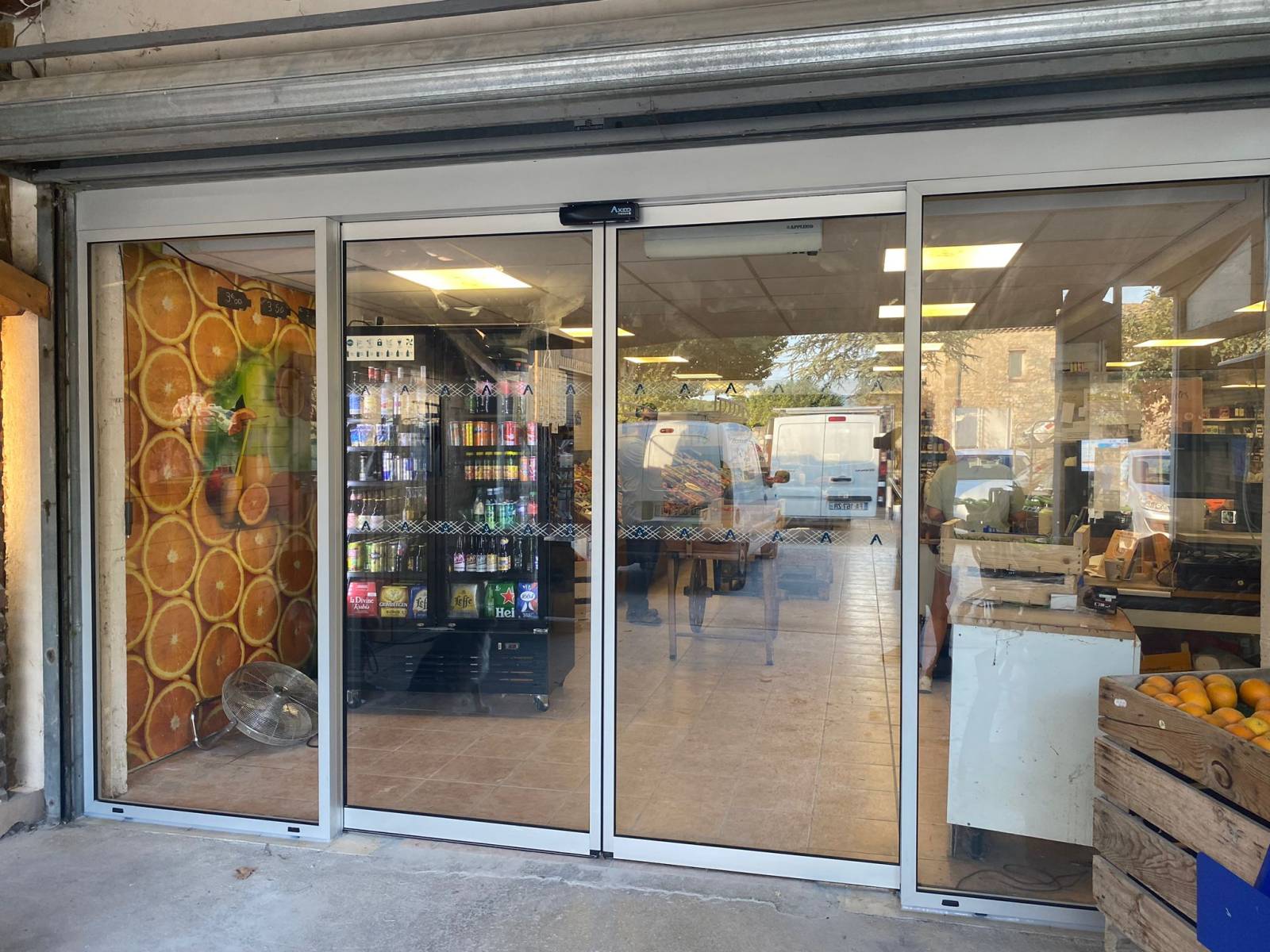 Porte coulissante automatique Visio 100 Manusa à 2 vantaux