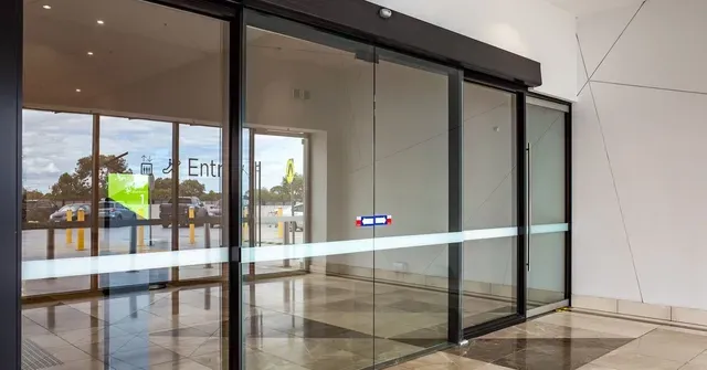 Porte automatique 2 vantaux coulissante