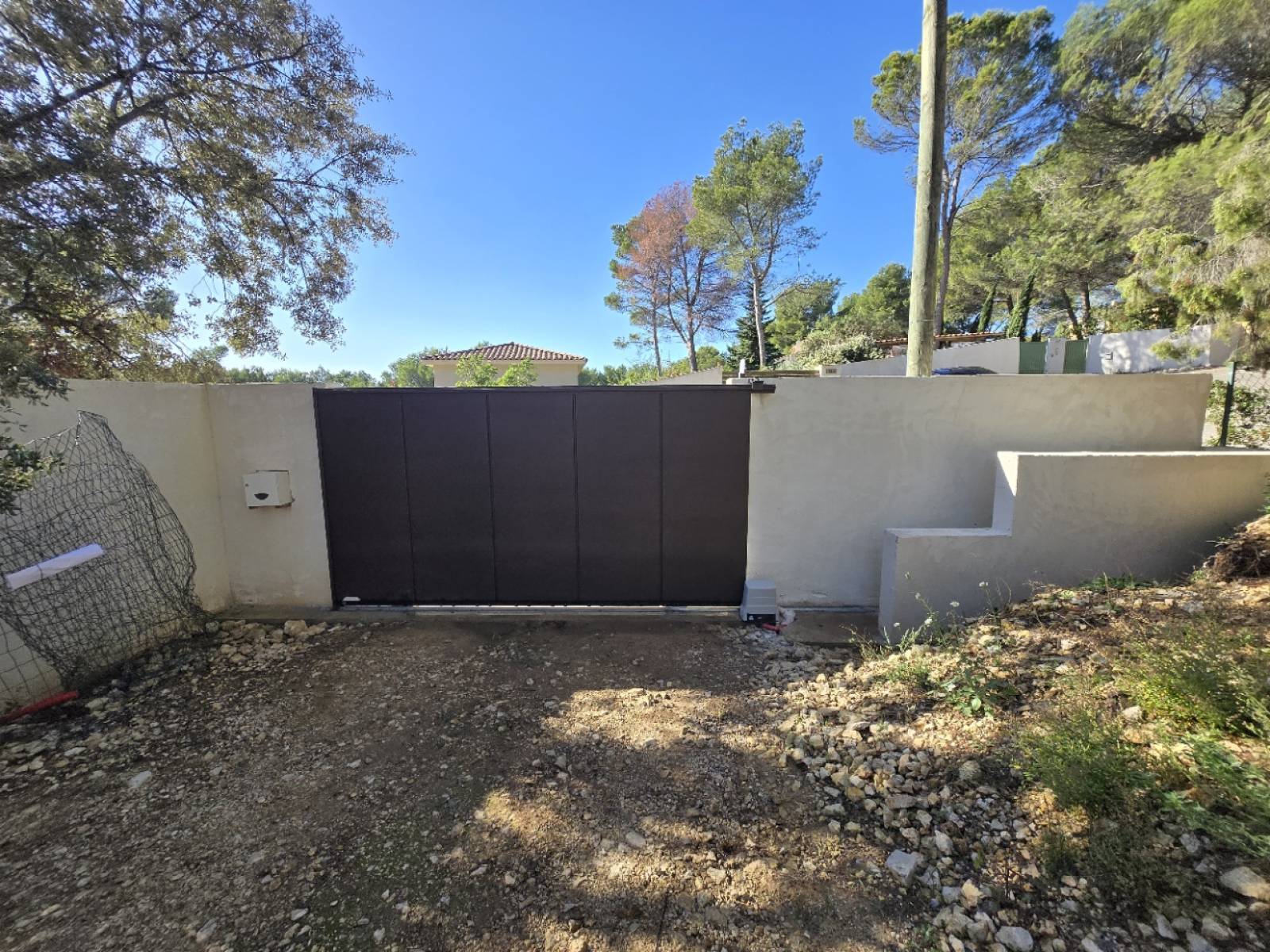 Portail coulissant avec motorisation Roger Technology