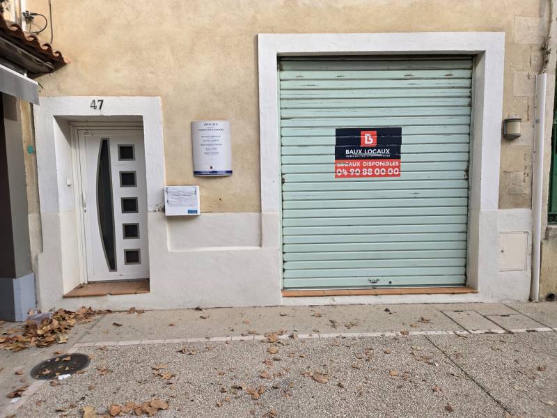 Remplacement d'un axe de rideau métallique