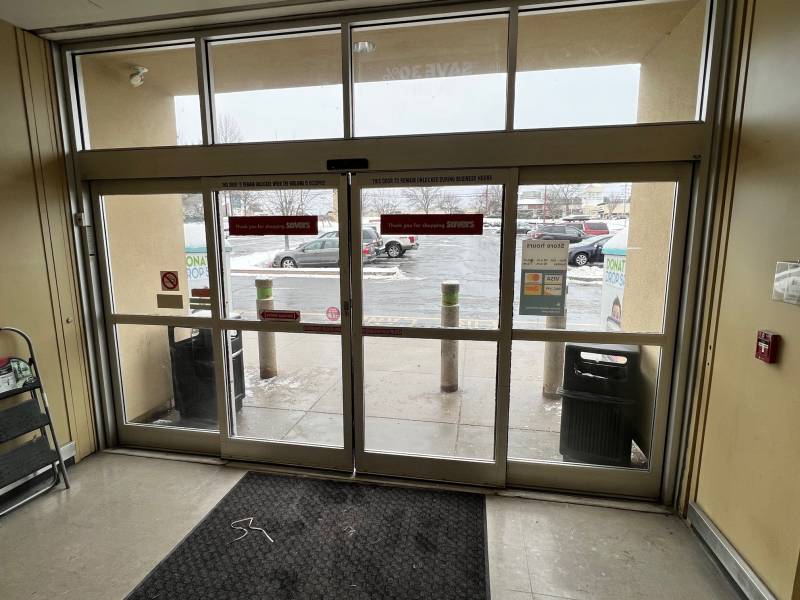 Porte automatique coulissante à 2 vantaux